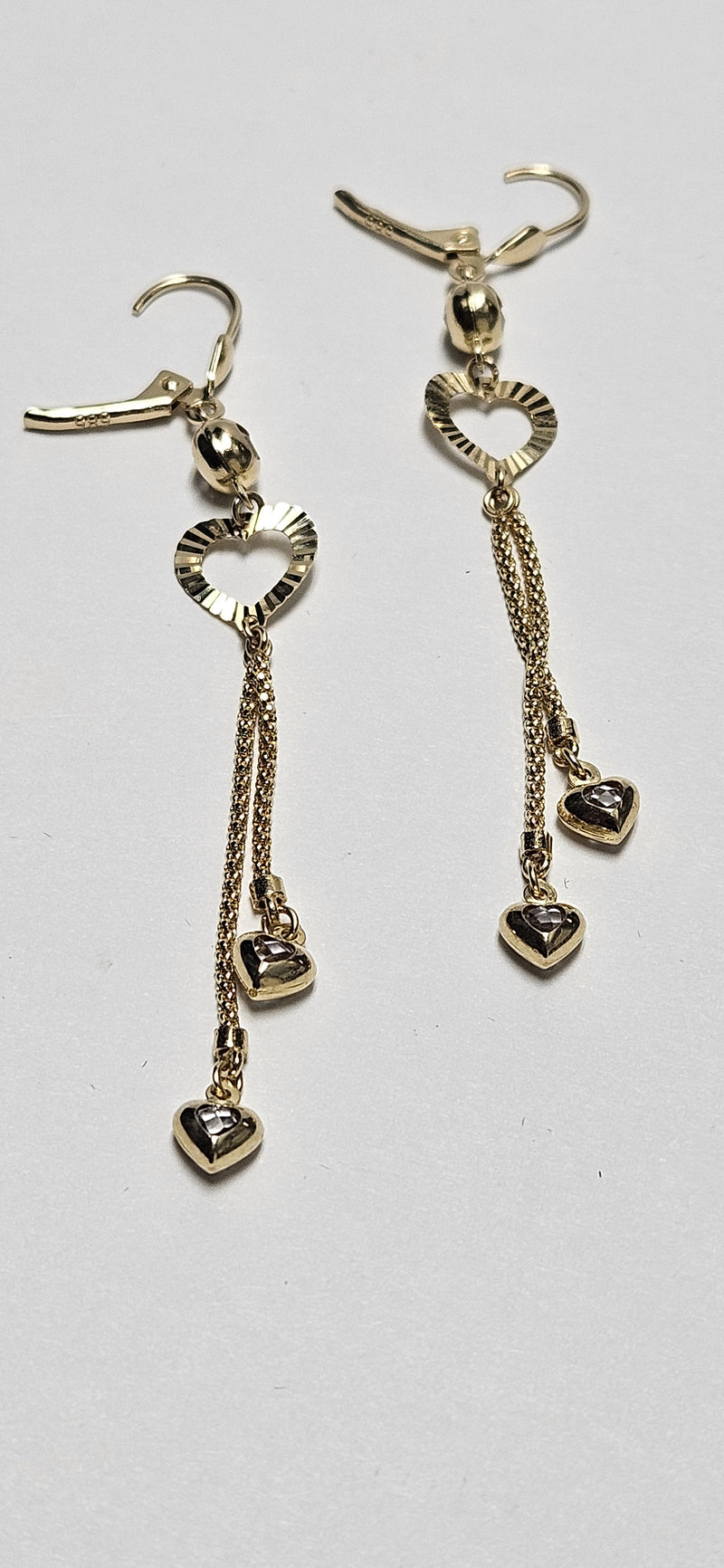 14kt heart dangle earrings with cubiczirconia