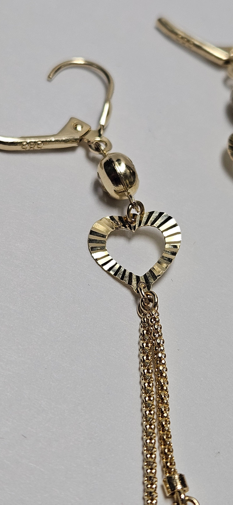 14kt heart dangle earrings with cubiczirconia