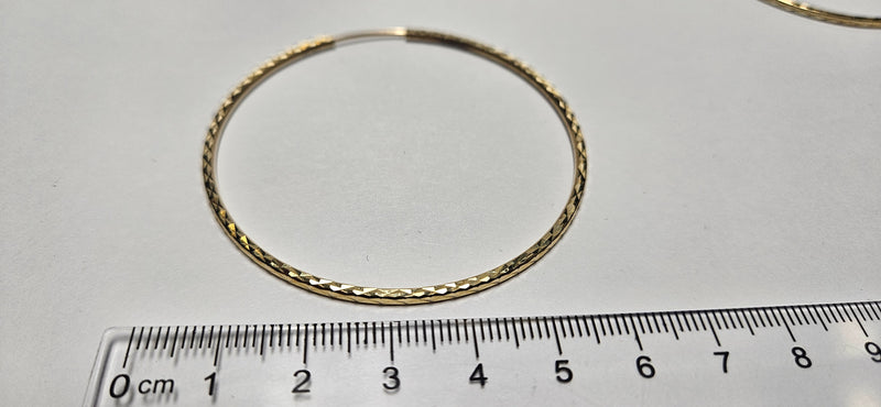 14kt large diamond cut hoops