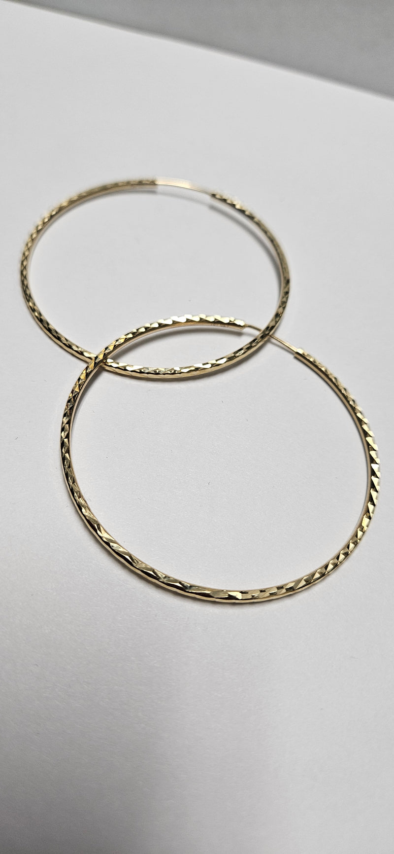 14kt large diamond cut hoops